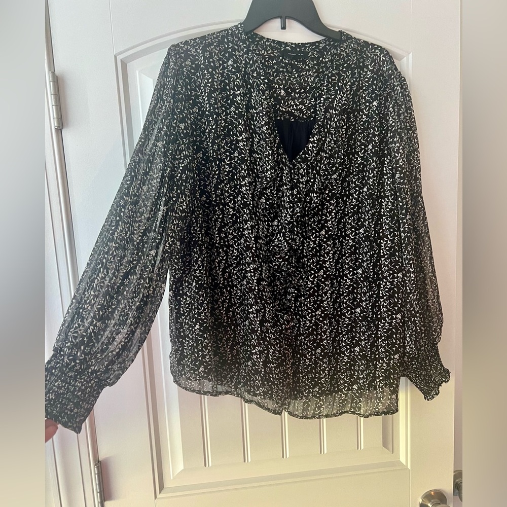 Black and white blouse size 1X, ruffle collar and shear long sleeves